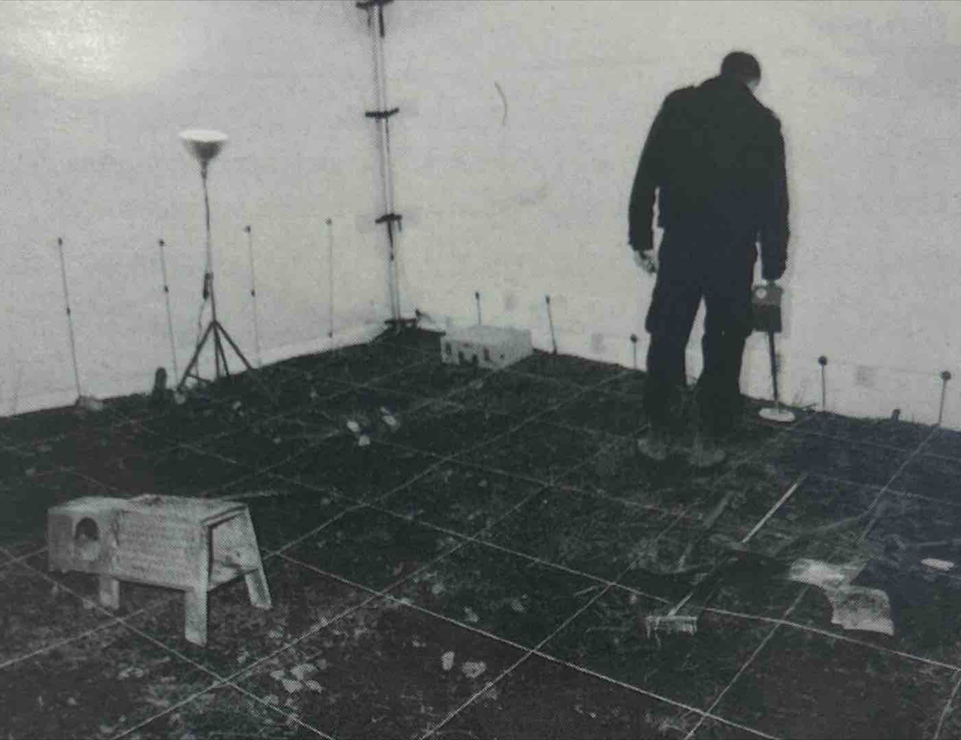 A man standing on top of a tiled floor